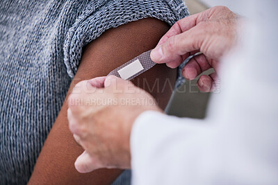 Buy stock photo Vaccine, plaster and doctor hands with patient for healthcare consultation, hospital first aid or medical support service. Pharmacy clinic nurse, closeup arm or pharmacist helping person with bandage