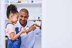 Pharmacy, child and family with medication, learning and healthcare study for education. Pharmacist, father and young girl together with a smile from pharmaceutical research and kid development