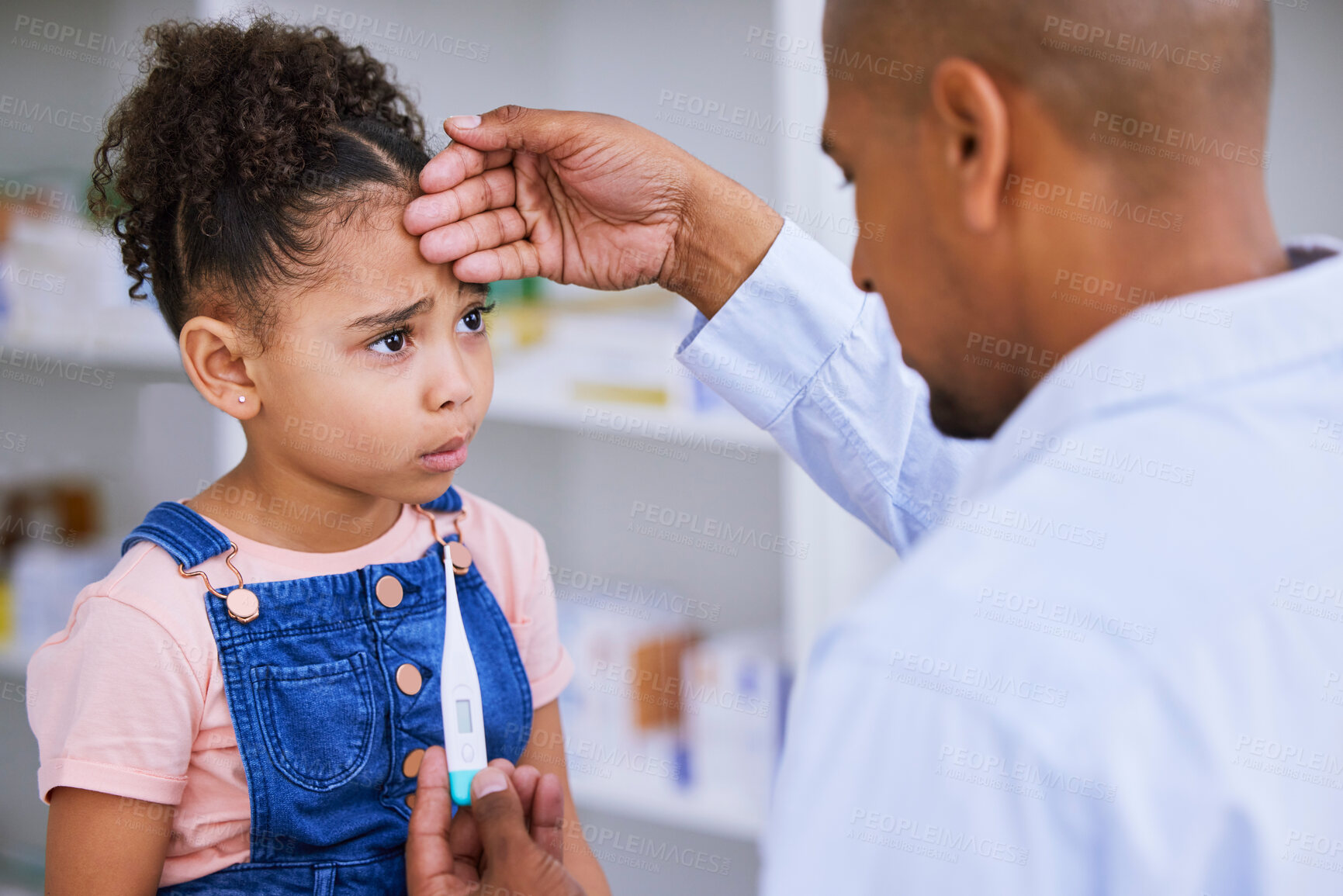 Buy stock photo Check for fever, thermometer and child with pediatrician at pharmacy, health and sick with medicine and help. Support, trust and healthcare, monitor illness or virus, man and young girl at clinic