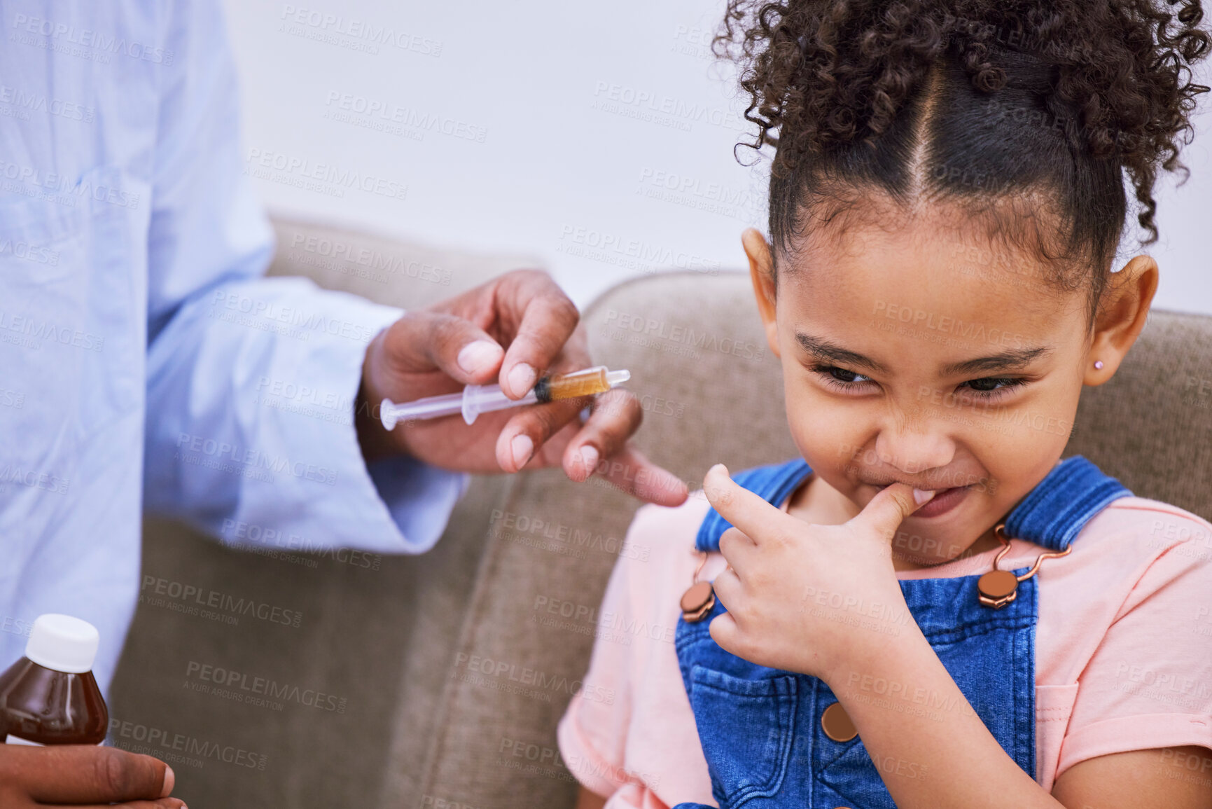 Buy stock photo Sick, syringe and disgust with child and medicine for consulting, helping and illness. Medical, healthcare and cough syrup with young girl and parent in family home for wellness, care and supplements