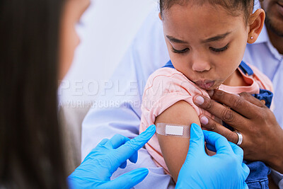 Buy stock photo Doctor, dad and kid with plaster for vaccine, flu shot or medicine injection in clinic or hospital. Father, girl with bandage and pediatrician in office for vaccination, consultation and child care.