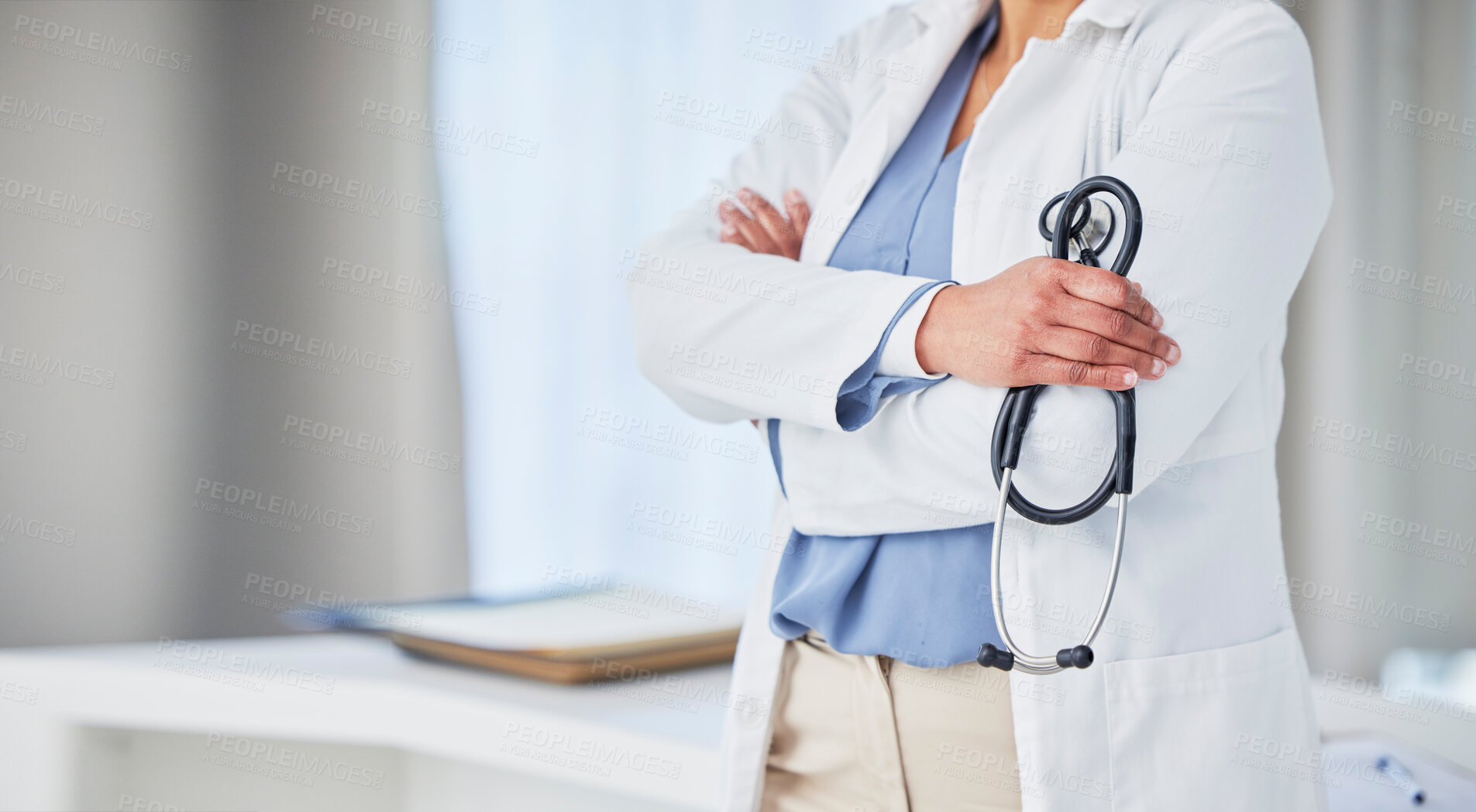 Buy stock photo Healthcare, hands and woman doctor with arms crossed in hospital with stethoscope for medical examination. Health, checkup and female in a consulting room with lungs, heart or breathing analysis tool