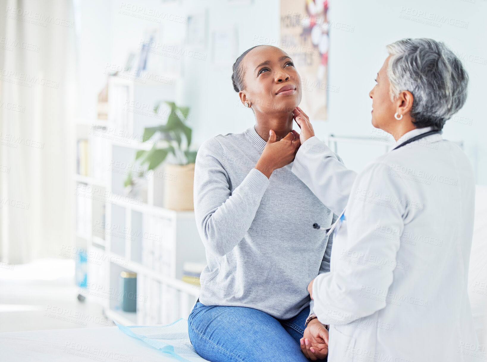 Buy stock photo Patient, doctor and hospital for sore throat of woman for virus, pain or infection. Healthcare worker and sick African person show neck for thyroid, examination or respiratory at medical consultation