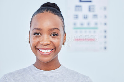 Buy stock photo Face, black woman smile and ophthalmology patient in hospital for vision, healthcare or wellness. Portrait, optometrist and happy person in clinic with eye chart for medical professional optician