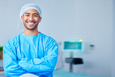 Buy stock photo Portrait, surgeon and Asian man with arms crossed in hospital, healthcare and wellness. Face, happy doctor and medical professional, expert nurse and confident surgery employee in scrubs in Cambodia