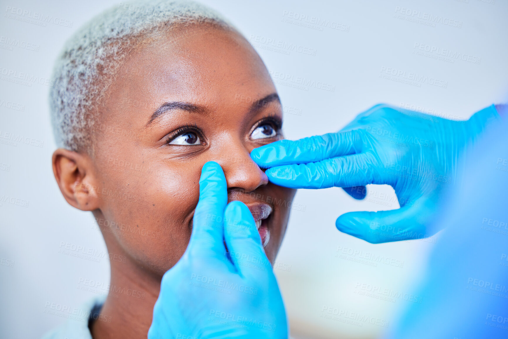 Buy stock photo Doctor hands, woman and rhinoplasty for nose job, cosmetics and aesthetic transformation or change. Medical, surgeon and plastic surgery of african patient or client face, dermatology help or support