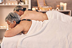 Relax, massage and hot stone with old couple in spa for vacation, luxury and beauty salon. Peace, wellness and holiday with senior woman and man in hotel for retirement, treatment and body care