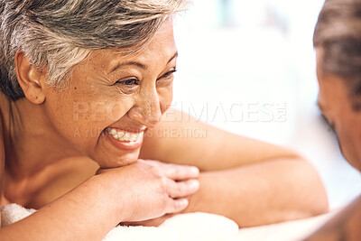 Buy stock photo Smile, relax and a mature couple at a spa for love, communication or a honeymoon together. Happy, wellness and a woman with a man on a bed for a treatment or grooming on a vacation at a hotel