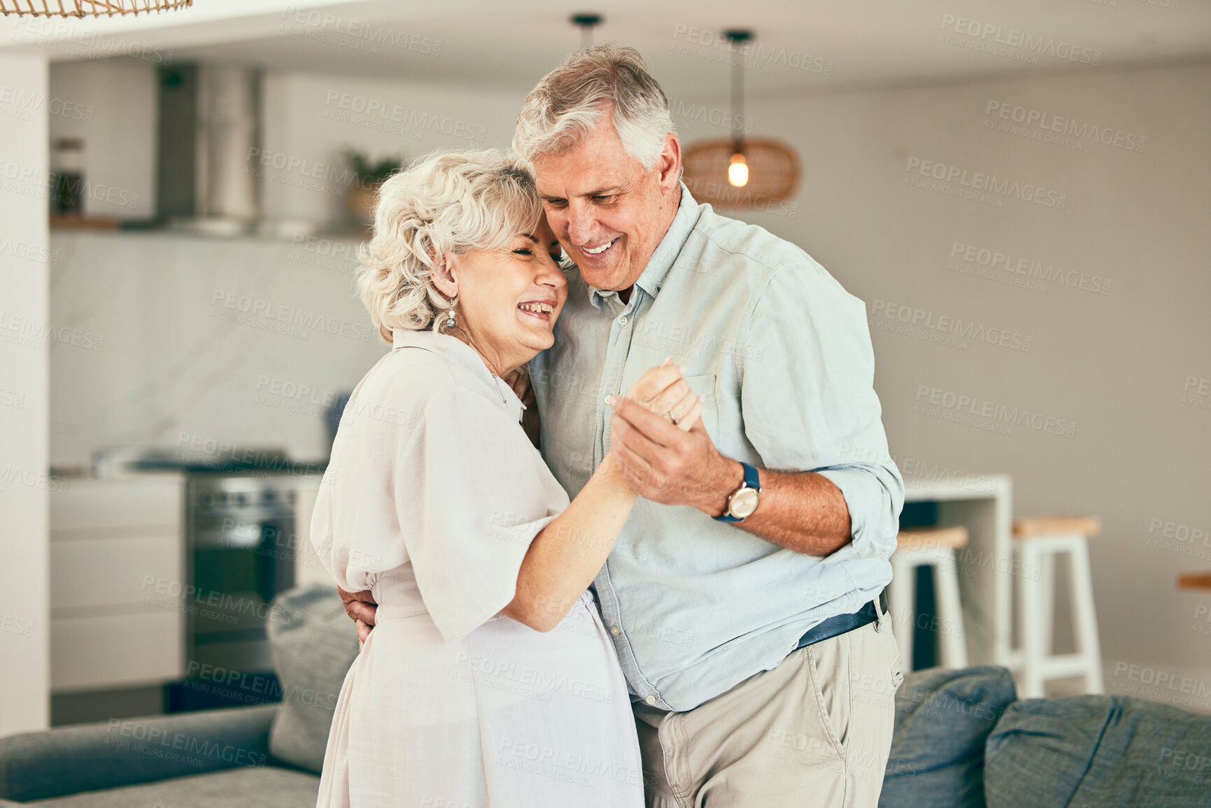 Buy stock photo Holding hands, home or happy old couple dancing for love or trust in marriage at home together. Hug, romantic elderly man or senior woman bonding with smile or care in retirement or house living room