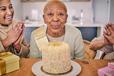 Buy stock photo Senior woman, blowing candle and cake portrait at a birthday party or event with clapping and excited. Elderly friends, smile and laughing in retirement and nursing home with celebration and fun