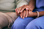 Nurse, holding hands and elderly support in a retirement and nursing home with care. Healthcare, nursing and medical professional with a patient showing empathy, kindness and compassion at doctor job