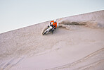 Bike, sand and mockup with a sports man riding a vehicle in the desert for adventure or adrenaline. Motorcycle, training and speed with an athlete on space in nature for power or active competition