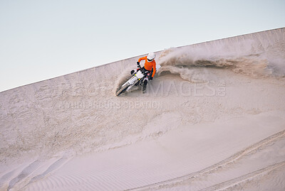 Buy stock photo Bike, sand and mockup with a sports man riding a vehicle in the desert for adventure or adrenaline. Motorcycle, training and speed with an athlete on space in nature for power or active competition