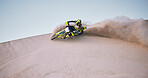 Bike, sand and space with a sports man riding a vehicle in the desert for adventure or adrenaline. Motorcycle, training and dust with an athlete on mockup in nature for power or active competition