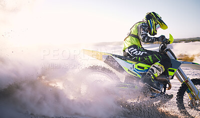 Buy stock photo Bike, sand and dust with a sports man riding a vehicle in the desert for adventure or adrenaline. Motorcycle, freedom and training at speed with an athlete outdoor in nature for power or competition