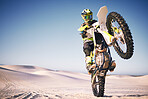 Bike, sand and balance with a man on mockup riding a vehicle in the desert for adventure or adrenaline. Motorcycle, training and freedom with an athlete on space in nature for power or competition