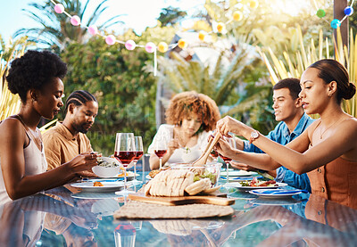 Buy stock photo Friends at dinner, party in summer in garden and happy event with diversity, food and wine for bonding together. Outdoor lunch, men and women at table, group of people eating with drinks in backyard
