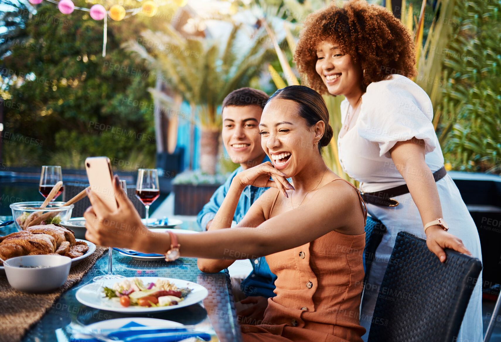 Buy stock photo Friends, food and selfie at outdoor table for holiday, Christmas or thanksgiving on social media. Young women, man or group with photography or influencer profile picture for happy brunch celebration