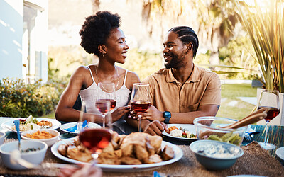 Buy stock photo Love, outdoor and black couple with lunch, smile and marriage with celebration, relationship and bonding. Romance, African man or happy woman with meal, food and relax with happiness, chat and eating