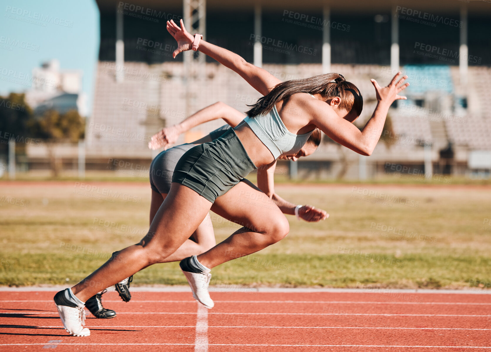 Buy stock photo Action, sports and athlete running sprint in competition or fitness game or training for energy wellness on track. Race, stadium and athletic people or runner exercise, speed and workout performance