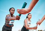 Woman, teamwork and baton in relay, running competition or sports fitness on stadium track. Active people or athlete passing bar in competitive race, sprint or coordination for team performance