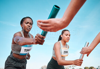 Buy stock photo Woman, teamwork and baton in relay, running competition or sports fitness on stadium track. Active people or athlete passing bar in competitive race, sprint or coordination for team performance