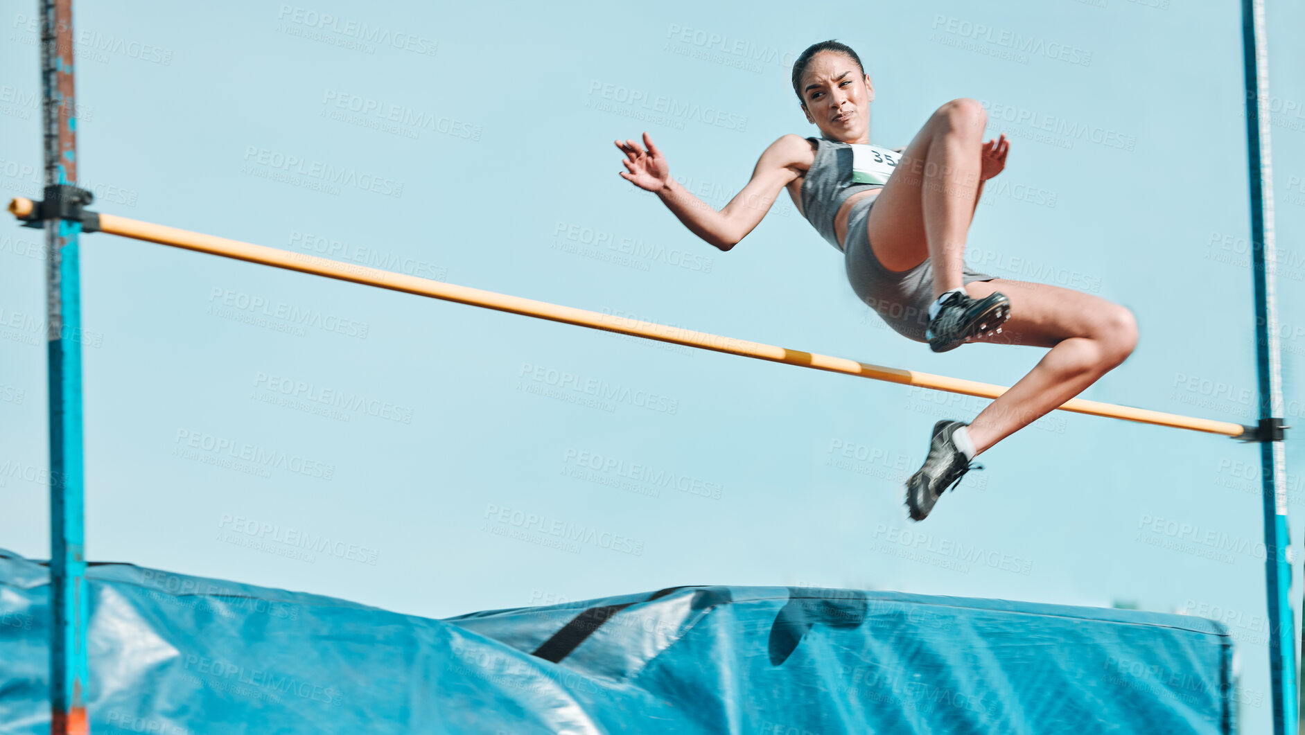 Buy stock photo High jump, woman and fitness with exercise, sport and athlete in a competition outdoor. Jumping, workout and training for performance with action, energy and contest with female person and athletics