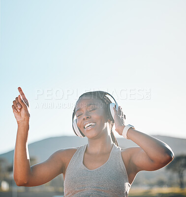 Buy stock photo Headphones, dancing and black woman at fitness training or outdoor workout for health wellness and enjoy music. Smile, African and athlete or person streaming audio or radio for exercise in a park