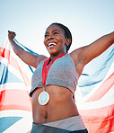 Fitness, winning and black woman with achievement, UK flag and sports with competition, victory and champion. African person, athlete or winner with British symbol, pride and medal with celebration