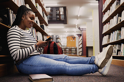 Buy stock photo Student, library and woman reading with phone for research, information or browsing internet website, social media or blog. College, campus and girl on smartphone for communication or knowledge