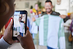 Fashion, phone and man taking a picture for shopping in a retail store for social media influencer. Style, cellphone and male content creator posing with clothes for an outfit for brand ambassador.