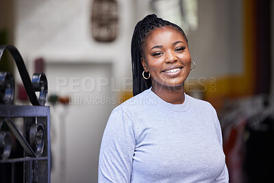 Buy stock photo Happy, black woman and portrait in clothes store, thrift shop and fashion workshop in owner pride. Smile, confident and professional designer in clothing small business, retail and donation industry