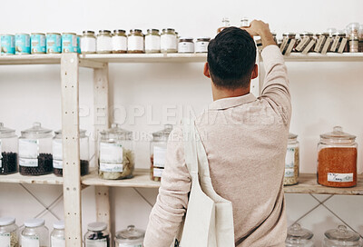 Buy stock photo Man, back and shopping by shelf in grocery store for healthy food, nutrition and wellness product sales. Choice, decision and customer nutritionist in supermarket for retail purchase, buying or deal