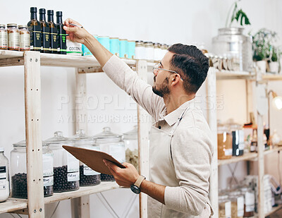 Buy stock photo Grocery store, eco friendly and man with clipboard for stock list, healthy food and sales report. Checklist, inventory and manager at small business, sustainable supermarket and groceries on shelf.