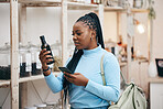 Woman, shopping and phone for ingredient reading in grocery store for healthy food, nutrition and product information. Research, confused and African customer with technology for supermarket choice