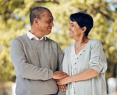 Buy stock photo Mature couple in park, love and smile, support and trust with bonding and marriage. Life partner, retirement together and romance, people are happy outdoor with healthy relationship and care