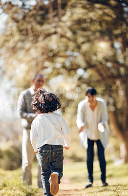 Buy stock photo Child, running and bonding with grandparents in park for fun, energy and summer break in nature. Kid, back and excited boy with senior man and woman on family weekend, activity and backyard games