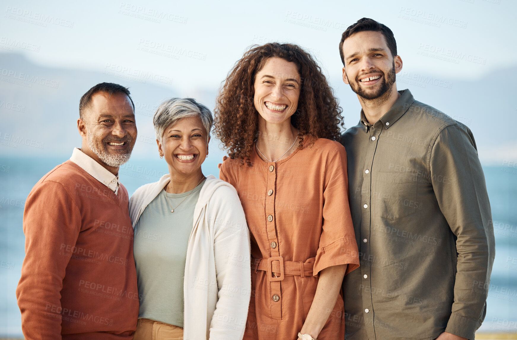 Buy stock photo Portrait, couple and senior parents at beach on holiday, vacation or travel. Face, family men and women at ocean for connection, bonding and having fun together, smile and happy on interracial trip