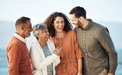 Buy stock photo Funny, happy and vacation with big family at beach for summer travels, care and support. Love, smile and happiness with senior parents and couple laughing in nature for holiday, relax and bonding