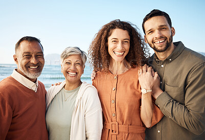 Buy stock photo Couple, portrait and mature parents at ocean on holiday, vacation or travel. Face, family men and women at beach for interracial connection, bonding and funny laugh together, smile and happy outdoor