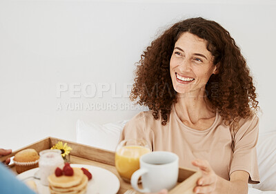 Buy stock photo Breakfast, morning and woman in bed for birthday, anniversary celebration and romantic gesture. Relationship, love and happy couple with healthy food on tray for wellness, nutrition and surprise