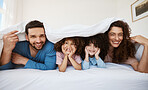 Bedroom portrait, children and parents happiness, bond or relax morning wellness, comfort or home stress relief. Blanket, face or happy family kids, mom and dad smile, support or rest on bed mattress