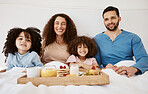 Happy children, parents or portrait of breakfast in bed, food and enjoy quality time together, comfort and stress relief. Happiness, family home apartment or bedroom kids, mom and dad relax with meal