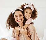 Mother, daughter and sleep mask, portrait and bonding with love, care and happy in the morning. Woman, young girl and hug at home with pajamas and family, positivity and fun together in bedroom