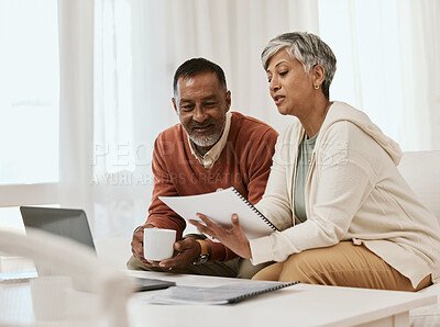 Buy stock photo Senior couple, tax documents and home with planning, budget or audit for wealth, compliance or investment. Mature man, woman and paperwork with laptop, financial strategy and thinking for retirement