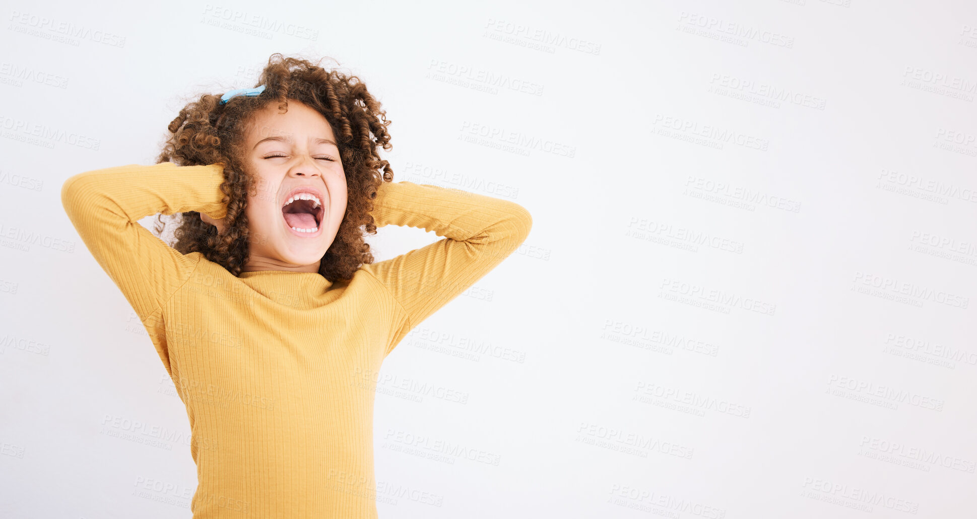 Buy stock photo Shouting, loud and mockup with a girl child in studio on a white background covering her ears. Children, sound and audio with a young kid screaming or yelling on empty space for ADHD or autism