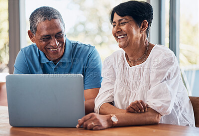 Buy stock photo Conversation, laptop and senior couple with communication and bonding in the dining room. Happy, smile and elderly man ad woman in retirement browsing on social media with computer together at home.