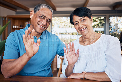 Buy stock photo Video call, wave and portrait of senior couple with communication in the dining room at home. Happy, smile and elderly man and woman in retirement greeting for an online virtual conversation together