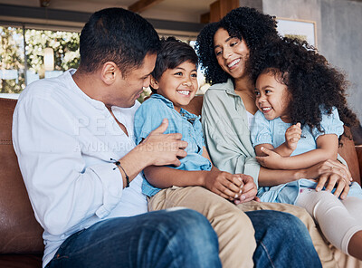 Buy stock photo Happy, tickle and relax with family on sofa for smile, bonding and peace on holiday. Love, care and happiness with parents and children in living room at home for vacation, cuddle or embrace together