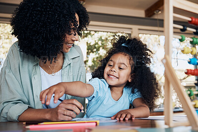 Buy stock photo Happy, learning and a mother with a child for homework, education support and together for teaching. Smile, family and a young mom with a girl kid for writing, project or studying in a house